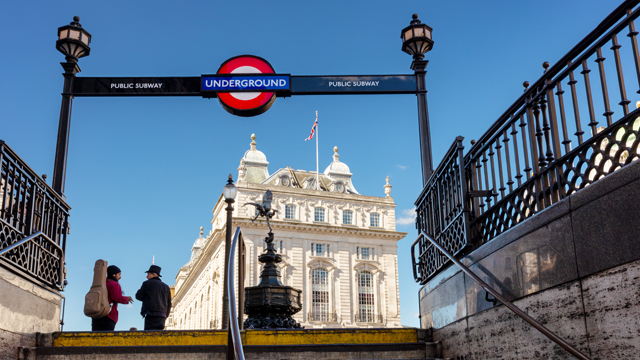 A London tube station exit onto Piccadilly Circus.