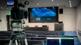 A camera is set up in the One Great George Street event studio in London.