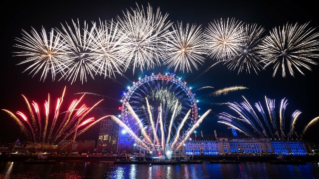 New Year's Eve fireworks illuminate the night's sky.