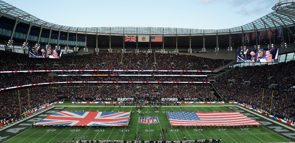 Flags on the pitch at Tottenham Hotspur Stadium during an NFL London Game in 2019.