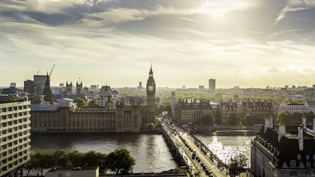 View of Westminster skyline on a sunny day, with the river Thames, Westminster Bridge, Big Ben and the Houses of Parliament.