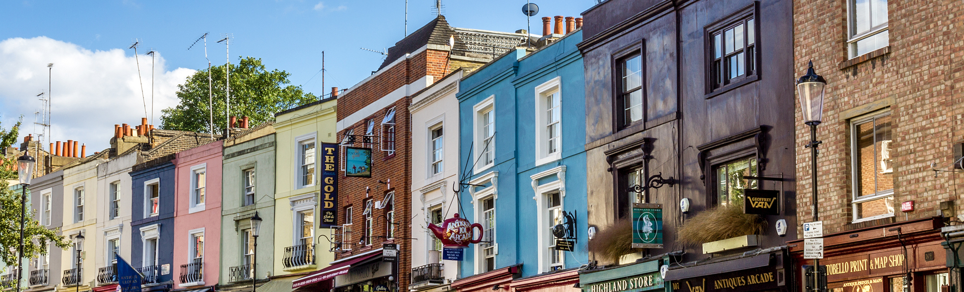 Colourful houses and antique shop fronts in Notting Hill.