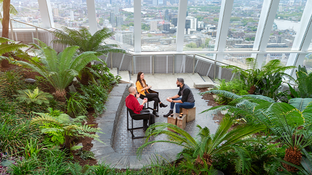 A group of people enjoying refreshments in Sky Garden