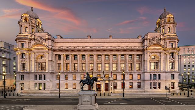 The exterior of Raffles at The OWO during sunset