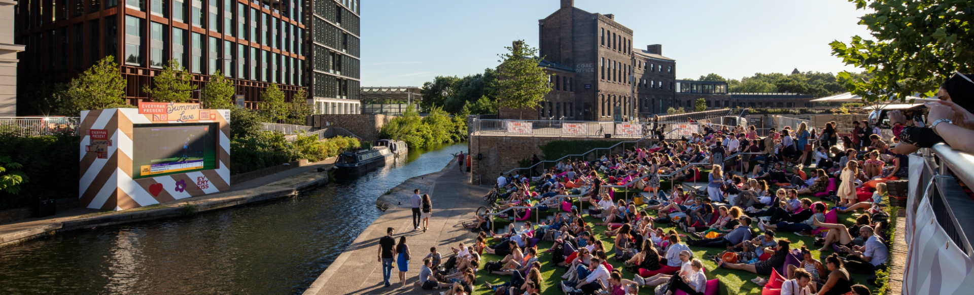 People enjoying a summer outdoor big screen experience