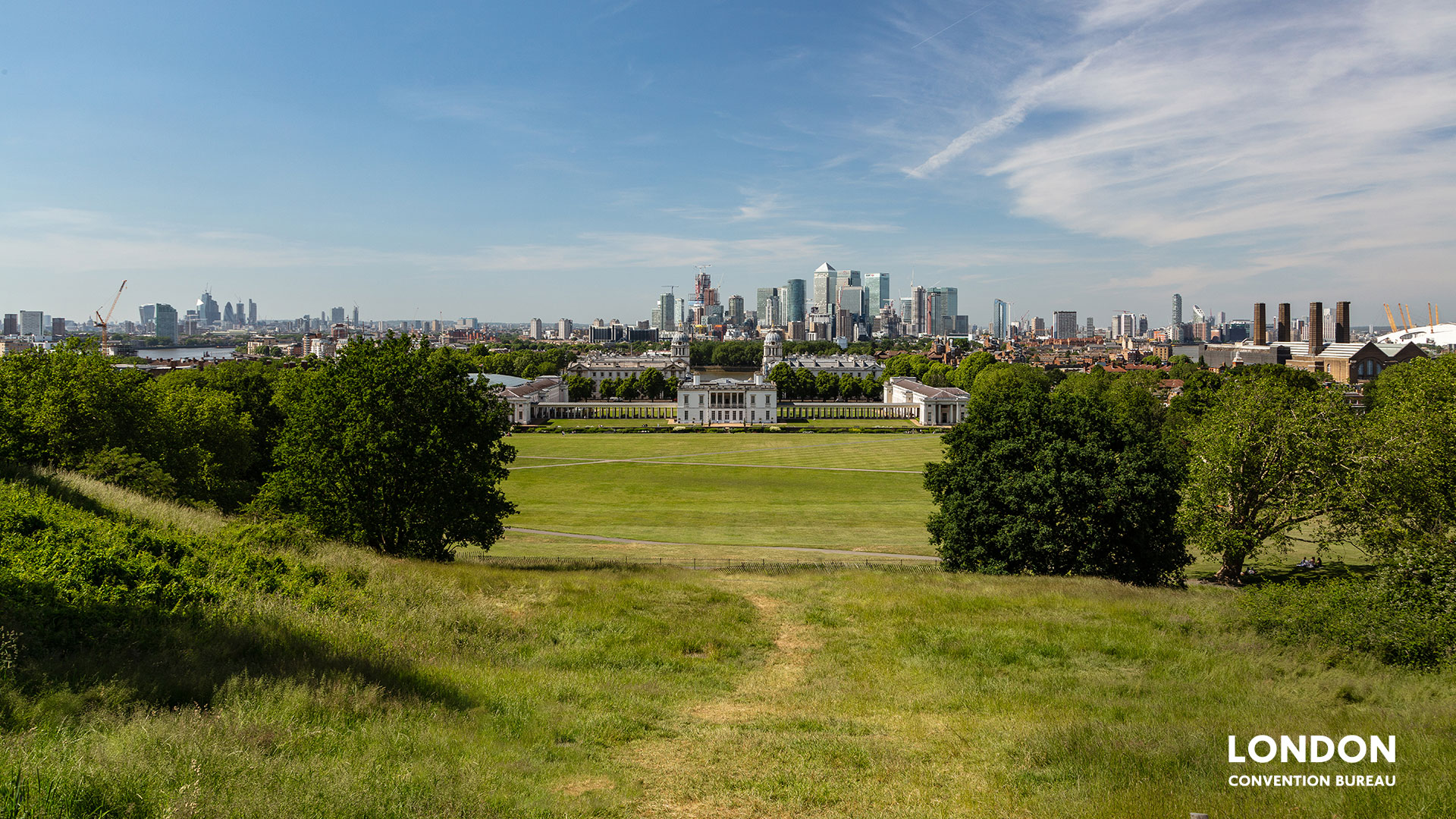 Greenwich Park with the London Skyline in the far back and green space all around.
