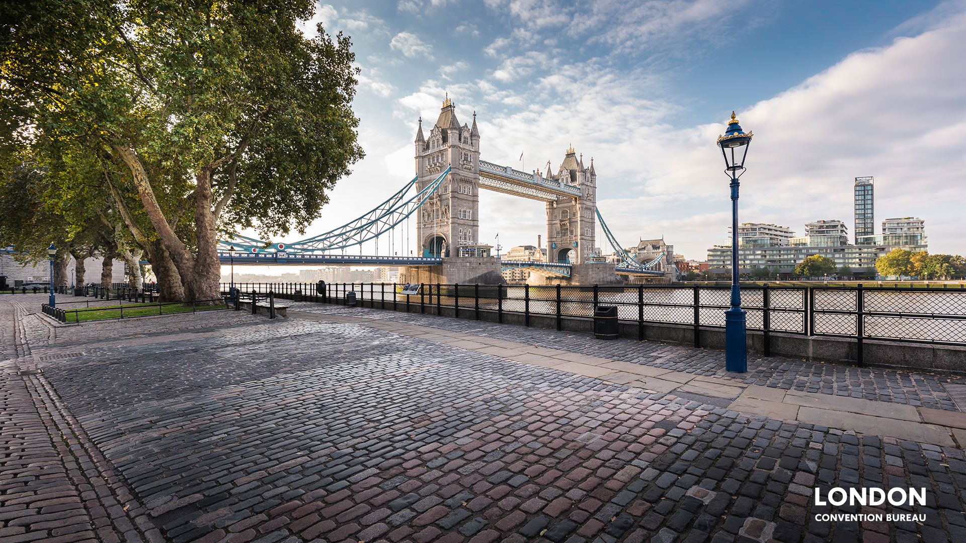 View of Tower bridge from the sidewalk.
